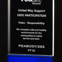 Main Image of Premium Series Glass Award clear glass upright on sapphire blue glass base.