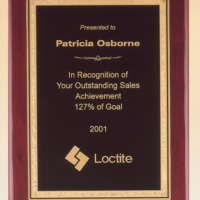 Main Image of Rosewood stained piano finish plaque with a black textured center plate and florentine border.