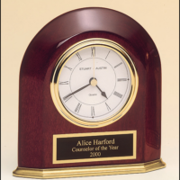 Main Image of Rosewood stained piano finish arched table clock with solid brass base and three hand movement.