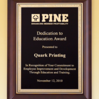 Main Image of Cherry finish wood plaque with furniture finish and a gold florentine plate.