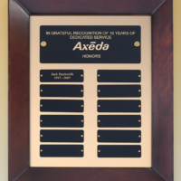 Main Image of Cherry finish frame perpetual plaque with 12 black brass plates on brush metal gold background