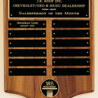 Main Image of Solid American walnut perpetual plaque with 12 black brass plates.