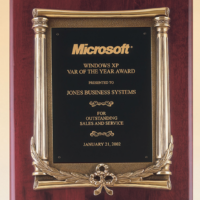 Main Image of Rosewood stained piano finish plaque with an antique bronze finished frame casting and black brass engraving plate.