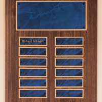 Main Image of Solid American walnut perpetual plaque with 12 plates and a sapphire marble finish.