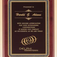 Main Image of Rosewood stained piano finish plaque with black florentine border and black textured center