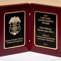 Main Image of High gloss rosewood stained book award. Two gold plates with black centers.
