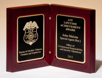Main Image of High gloss rosewood stained book award. Two gold plates with black centers.