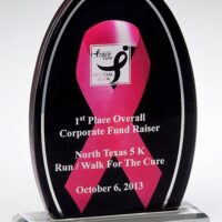 Main Image of Breast cancer awareness acrylic. Pink ribbon against a black background with a mirror silver border.