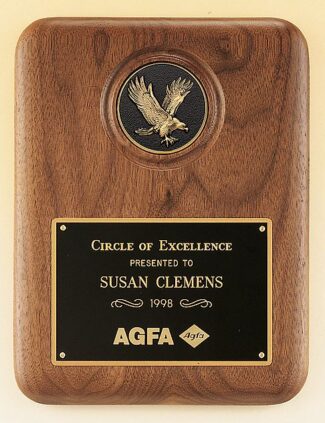 Main Image of American walnut plaque with a finely detailed black and gold eagle medallion