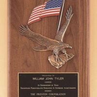Solid American walnut Airflyte plaque with a large eagle and American flag casting