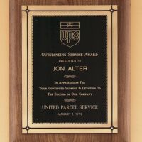 Main Image of Solid American walnut plaque with an antique bronze Phoenix frame casting