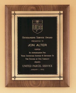 Main Image of Solid American walnut plaque with an antique bronze Phoenix frame casting